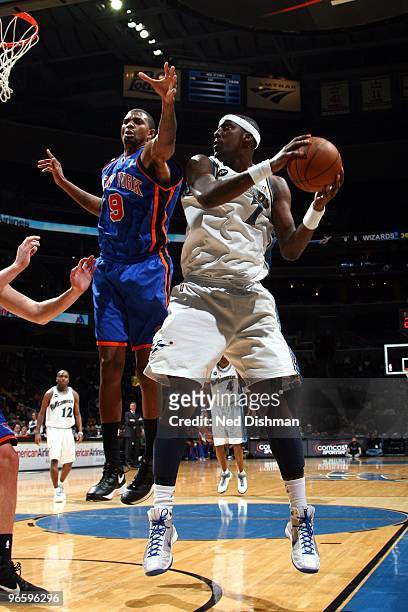 Andray Blatche of the Washington Wizards makes a move against Jonathan Bender of the New York Knicks during the game at the Verizon Center on January...