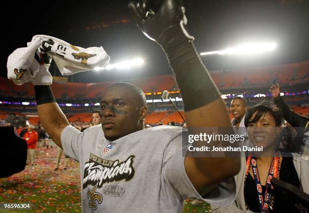 Reggie Bush of the New Orleans Saints celebrates after defeating the Indianapolis Colts during Super Bowl XLIV on February 7, 2010 at Sun Life...