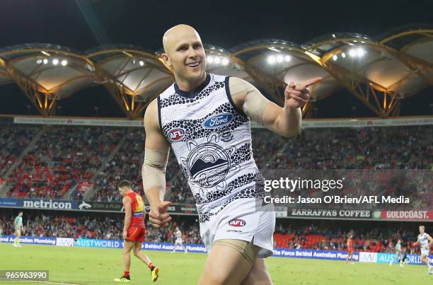 Gary Ablett of the Cats celebrates kicking a goal during the round 11 AFL match between the Gold Coast Suns and the Geelong Cats at Metricon Stadium...