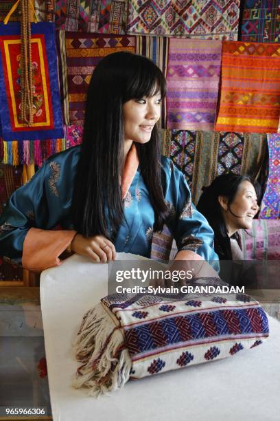 District of Paro, the City of Paro, in Chencho Handycraft shop, Mrs Chuki Wangmo and her daughter Tandin Bidha, a movie actress // Bhoutan , district...