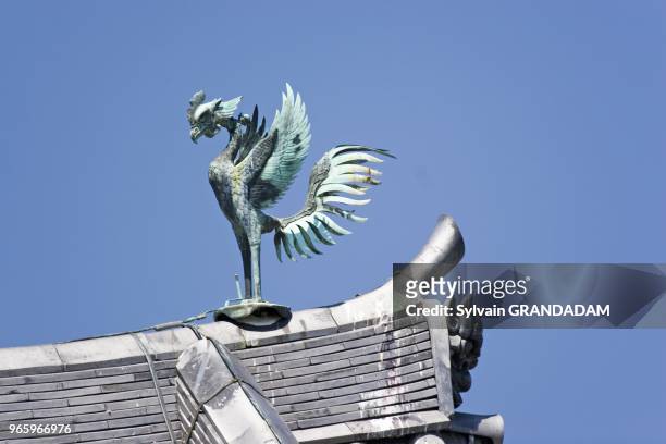 Uji près de Kyoto. Oiseau Phenix sur le toit du temple du Biyodo-in Uji près de Kyoto. Oiseau Phenix sur le toit du temple du Biyodo-in.