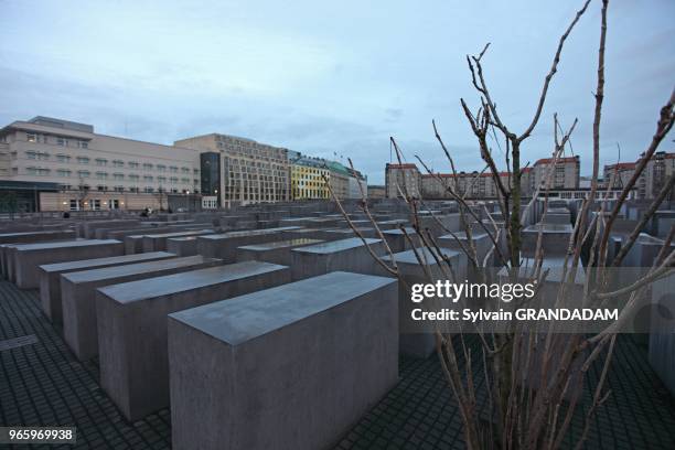 Germany, Berlin, Holocaust memorial Monument to the Murdered Jews of Europe is a field of 2,700 concrete slabs near the Brandenburg Gate, erected...