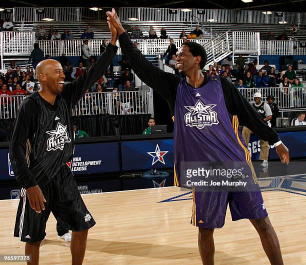 Green and Bruce Bowen NBA Legends high five on center court at Jam Session presented by Adidas during NBA All Star Weekend at the Dallas Convention...