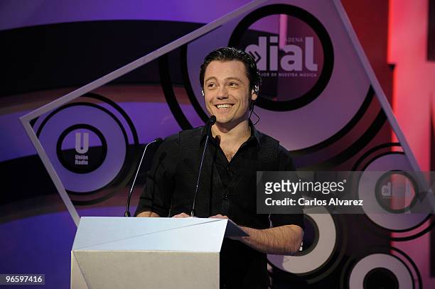 Singer Tiziano Ferro receives an award during "Cadena Dial" 2010 awards at the Tenerife Auditorium on February 11, 2010 in Tenerife, Spain.