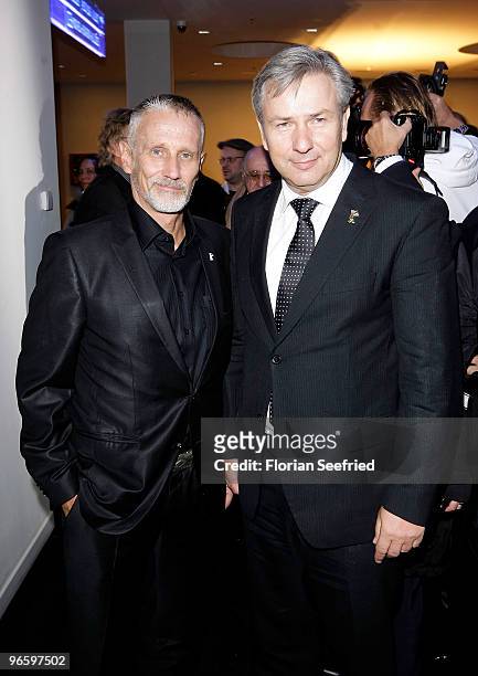Berlin Mayor Klaus Wowereit and Joern Kubicki attend the opening party of the 60th Berlin Film Festival at Cafe Moskau on February 11, 2010 in...