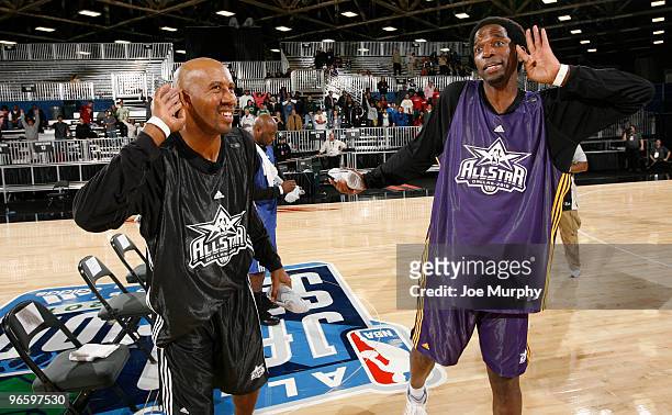 Green and Bruce Bowen NBA Legends toss autographed shirts to fans on center court at Jam Session presented by Adidas during NBA All Star Weekend at...