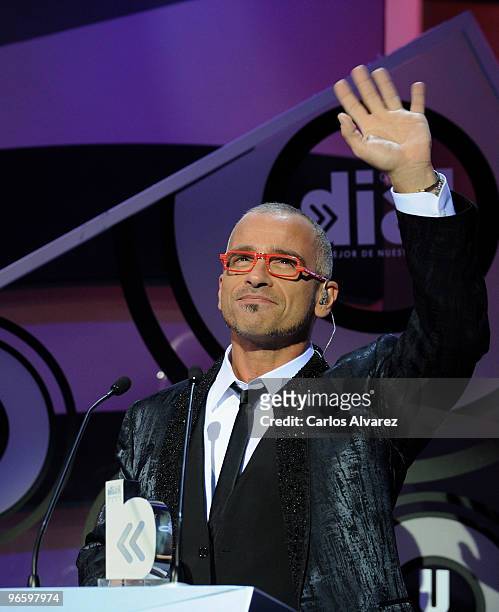 Singer Eros Ramazzoti receives an award during the ''Cadena Dial'' 2010 awards at the Tenerife Auditorium on February 11, 2010 in Tenerife, Spain.