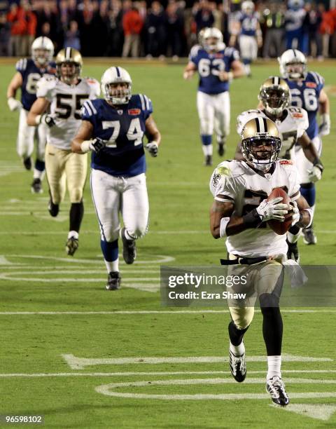Tracy Porter of the New Orleans Saints returns a interception for a touchdown against of the Indianapolis Colts during Super Bowl XLIV on February 7,...