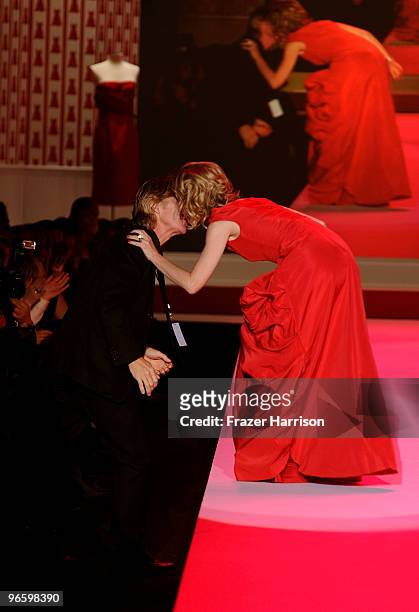 Actors William Macy and Felicity Huffman on the runway at the Heart Truth Fall 2010 Fashion Show during Mercedes-Benz Fashion Week at The Tent at...
