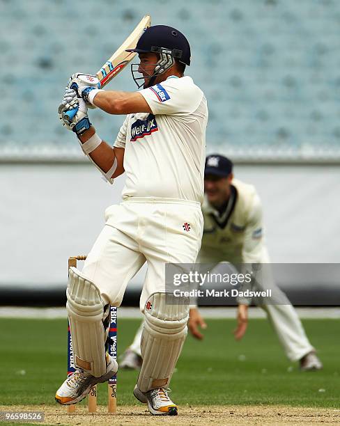 Phil Jaques of the Blues pulls a short ball for four runs during day one of the Sheffield Shield match between the Victorian Bushrangers and the New...