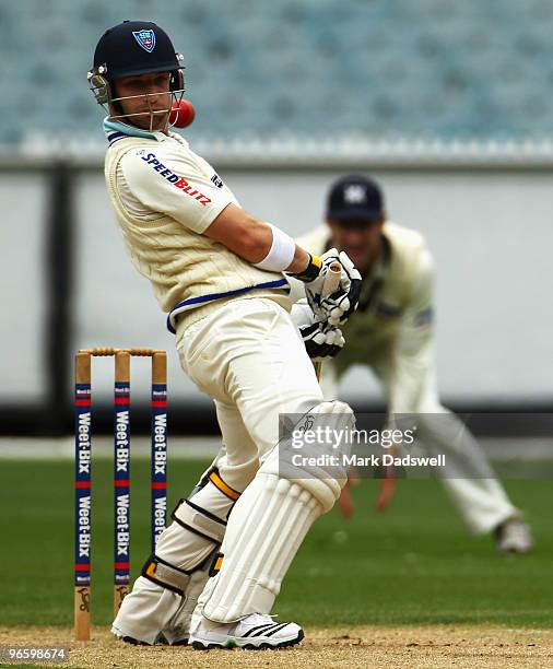 Phillip Hughes of the Blues leans back to let a short ball through to the keeper during day one of the Sheffield Shield match between the Victorian...