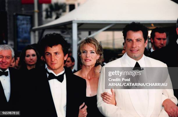 Sean Penn, Robin Wright et John Travolta à la présentation du film 'She's So Lovely' de Nick Cassavetes le 16 mai 1997 au festival de Cannes, France.