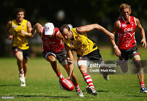 Jude Bolton of the Swans picks up a loose ball during a Sydney Swans intra-club AFL match at Lakeside Oval on February 12, 2010 in Sydney, Australia.