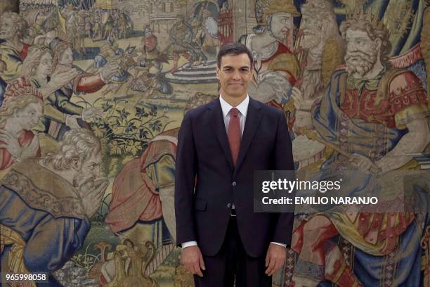 Spain's new Prime Minister Pedro Sanchez smiles during a swearing-in ceremony at the Zarzuela Palace near Madrid on June 2, 2018. Spain's Socialist...