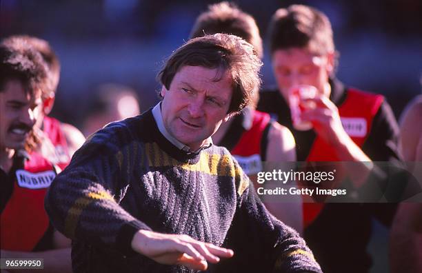 Essendon Bombers coach Kevin Sheedy addresses his players during a VFL match in Melbourne, Australia.