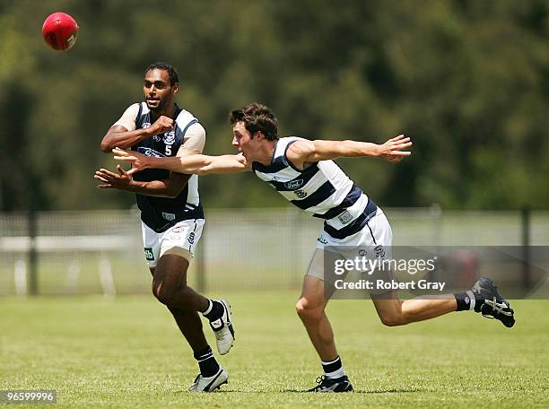 Travis Varcoe of Geelong hand passes the ball during a Geelong Cats intra-club AFL match at Gipps Road Park on February 12, 2010 in Sydney, Australia.