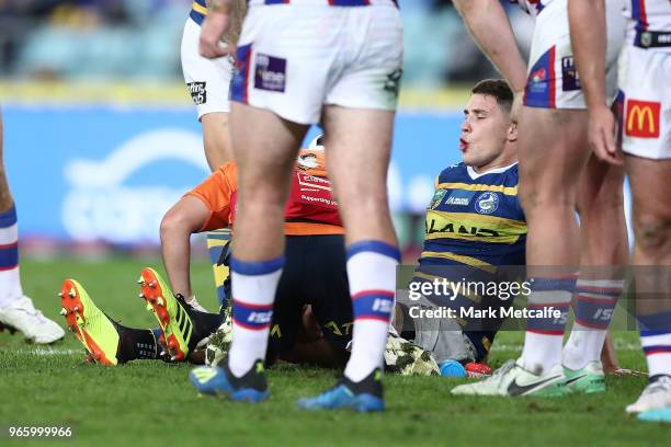 Mitchell Moses of the Eels lays on the field injured during the round 13 NRL match between the Parramatta Eels and the Newcastle Knights at ANZ...
