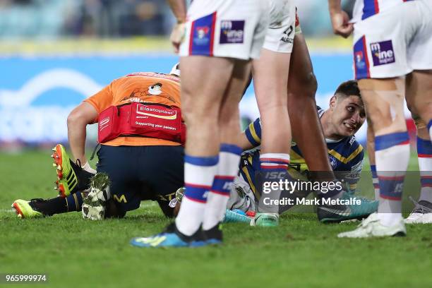 Mitchell Moses of the Eels lays on the field injured during the round 13 NRL match between the Parramatta Eels and the Newcastle Knights at ANZ...