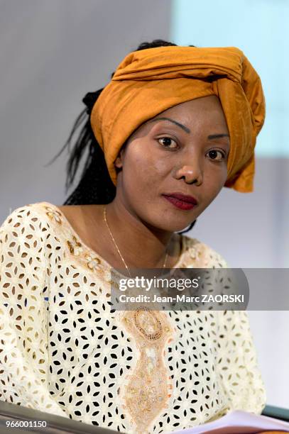 Nakouty Luyet, militante ivoirienne vivant en Suisse, membre du parti politique ivoirien COJEP , présidente de l'association Imonka lors du 31e salon...