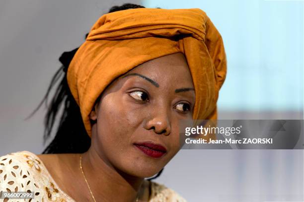 Nakouty Luyet, militante ivoirienne vivant en Suisse, membre du parti politique ivoirien COJEP , présidente de l'association Imonka lors du 31e salon...