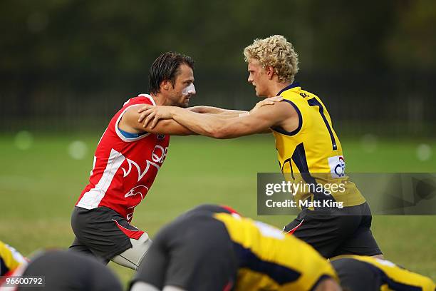 Nick Malceski and Campbell Heath of the Swans warm up before a Sydney Swans intra-club AFL match at Lakeside Oval on February 12, 2010 in Sydney,...