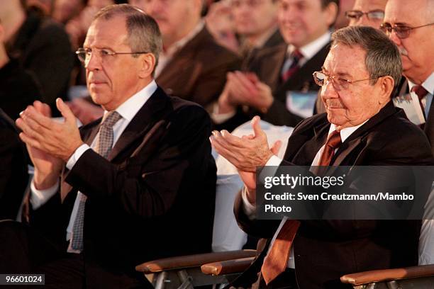 Cuban President Raul Castro , brother of Revolution leader Fidel Castro, and Russian Foreign Minister Sergei Lavrov applaud during the opening...