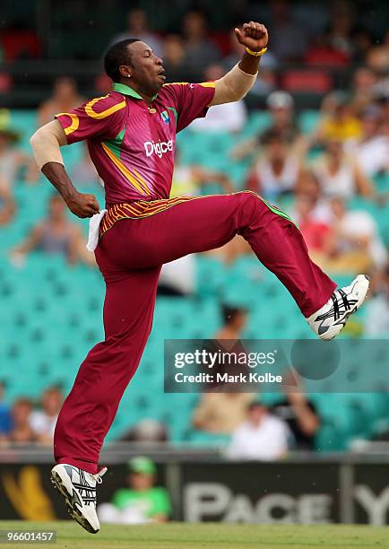 Kieron Pollard of the West Indies celebrates taking the wicket of Cameron White of Australia during the Third One Day International match between...