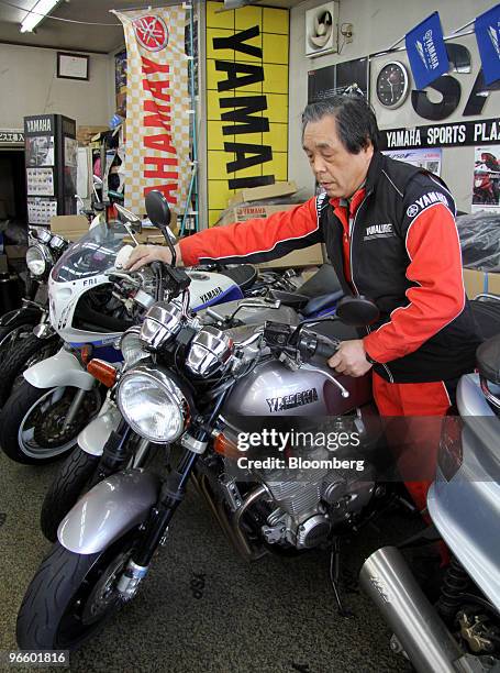 Shigenobu Mukaiyama, owner of a Yamaha Motor Co. Dealer, works at his motorcycle shop in Tokyo, Japan, on Wednesday, Feb. 10, 2010. Yamaha Motor Co.,...