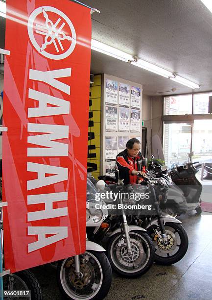 Shigenobu Mukaiyama, owner of a Yamaha Motor Co. Dealer, works at his motorcycle shop in Tokyo, Japan, on Wednesday, Feb. 10, 2010. Yamaha Motor Co.,...