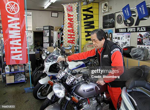 Shigenobu Mukaiyama, owner of a Yamaha Motor Co. Dealer, works at his motorcycle shop in Tokyo, Japan, on Friday, Feb. 12, 2010. Yamaha Motor Co.,...