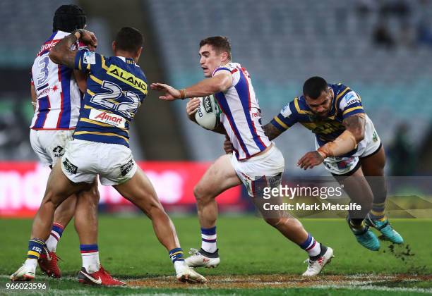 Connor Watson of the Knights in action during the round 13 NRL match between the Parramatta Eels and the Newcastle Knights at ANZ Stadium on June 2,...