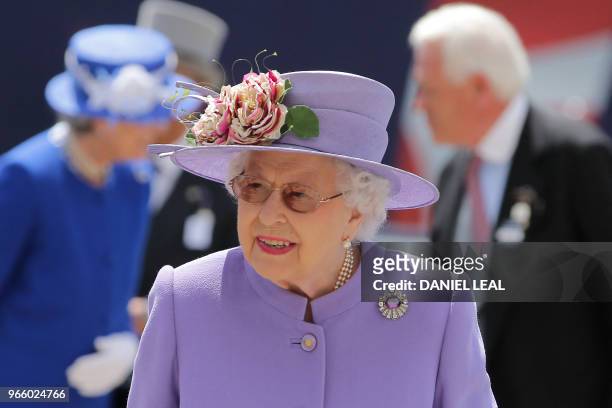 Britain's Queen Elizabeth II arrives on the second day of the Epsom Derby Festival in Surrey, southern England on June 2, 2018.