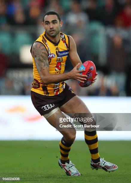 Shaun Burgoyne of the Hawks runs with the ball during the round 11 AFL match between the Hawthorn Hawks and the Port Adelaide Power at University of...