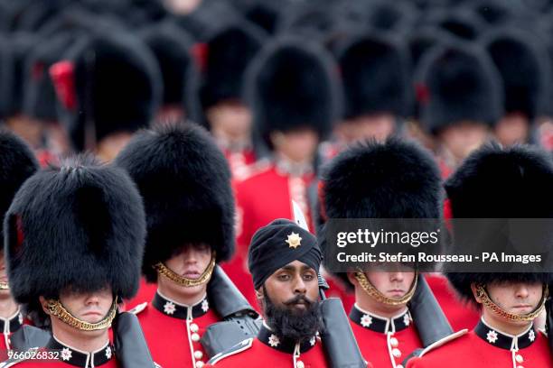 Sikh member of the Coldstream Guards wearing a turban as he takes part in the Colonel's Review, the final rehearsal for Trooping the Colour, the...