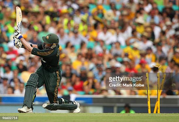 Michael Hussey of Australia is bowled by Dwayne Smith of the West Indies during the Third One Day International match between Australia and the West...