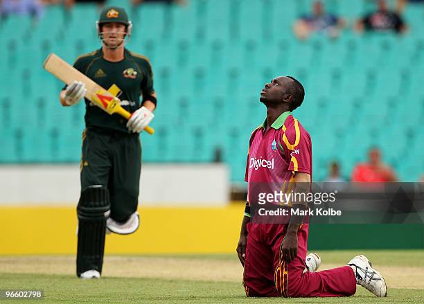 Nikita Miller of West Indies reacts after mis-fielding a drive from Michael Clarke of Australia during the Third One Day International match between...
