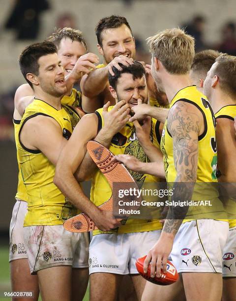 Shane Edwards of the Tigers awarded bet player of the round 11 AFL match between the Essendon Bombers and the Richmond Tigers at Melbourne Cricket...