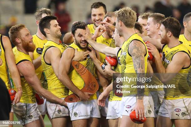 Shane Edwards of the Tigers awarded bet player of the round 11 AFL match between the Essendon Bombers and the Richmond Tigers at Melbourne Cricket...