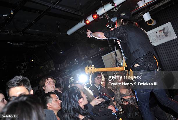 Petter Ericson Stakee of the band Alberta Cross performs at a fashion week party hosted by John Varvatos and L'Uomo Vogue at 315 Bowery on February...