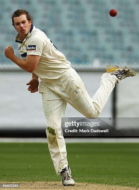 Jon Holland of the Bushrangers bowls during day one of the Sheffield Shield match between the Victorian Bushrangers and the New South Wales Blues at...