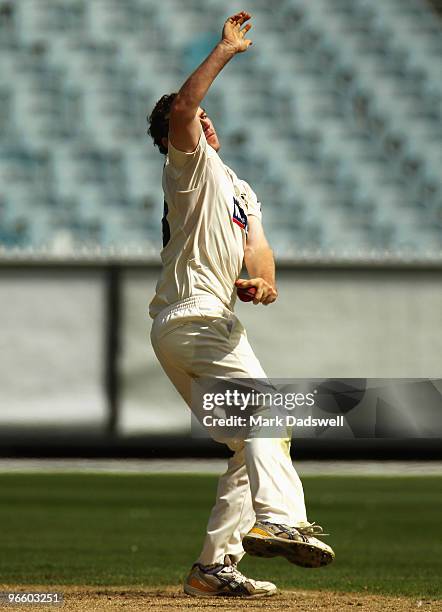 Jon Holland of the Bushrangers bowls during day one of the Sheffield Shield match between the Victorian Bushrangers and the New South Wales Blues at...