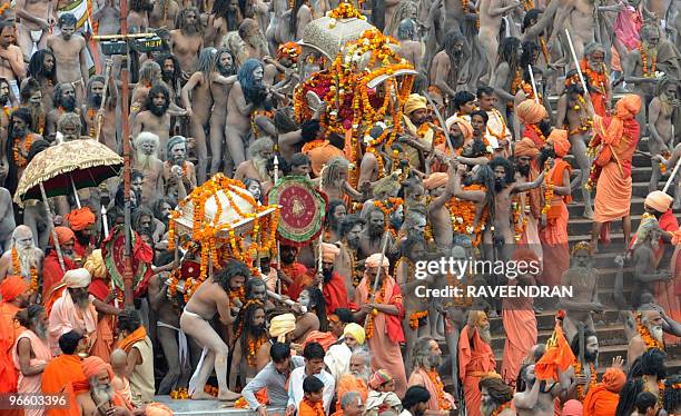 Indian Naga Sadhus - Holy Men - gather to bathe at Har-ki-Pauri in the River Ganges in Haridwar on February 12 during the First Shahi Snan - Royal...