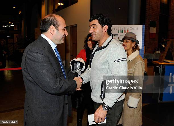 Alberto Tomba and Rocco Crimi at Casa Italia on February 11, 2010 in Vancouver, Canada.