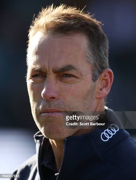 Alastair Clarkson, coach of the Hawks speaks to his team during a quarter time break during the round 11 AFL match between the Hawthorn Hawks and the...