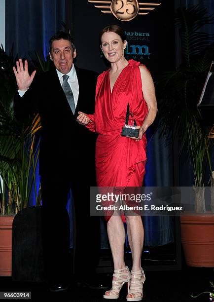 Producer Ivan Reitman and actress Julianne Moore pose at the presentation of the Santa Barbara Film Festival Montecito Award to actress Julianne...