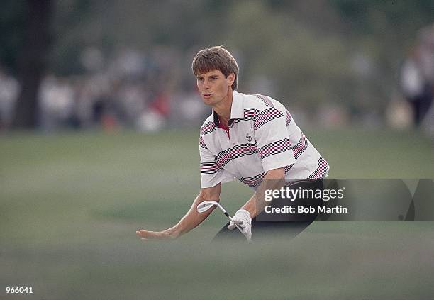 Paul Azinger of USA chips in at the 17th during the final day singles of the Ryder Cup at the Belfry in Sutton Coldfield, England. \ Mandatory...