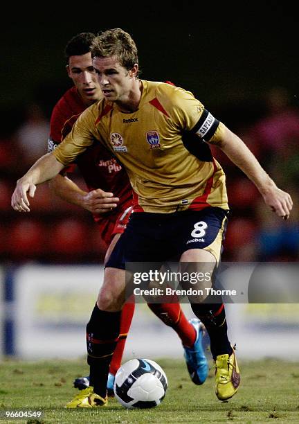 Matthew Thompson of the Jets competes with the Adelaide defence during the round 27 A-League match between the Newcastle Jets and Adelaide United at...