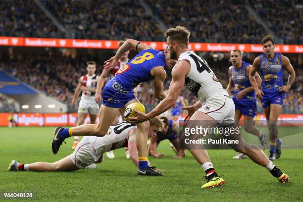 Maverick Weller of the Saints looks to pass the ball during the round 11 AFL match between the West Coast Eagles and the St Kilda Saints at Optus...