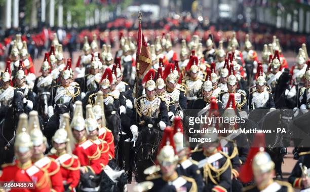 Members of the Household Cavalry make their way down The Mall after taking part in the Colonel's Review, the final rehearsal of the Trooping the...