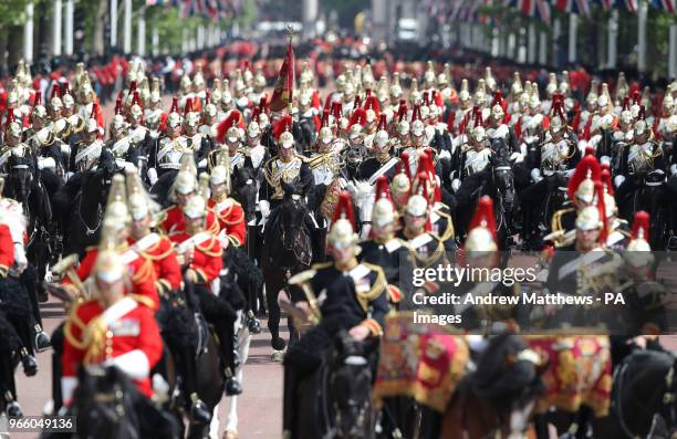 Members of the Household Cavalry make their way down The Mall after taking part in the Colonel's Review, the final rehearsal of the Trooping the...